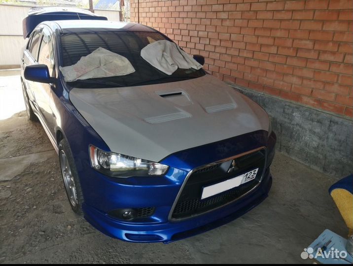 Капот EVO для Mitsubishi Lancer X