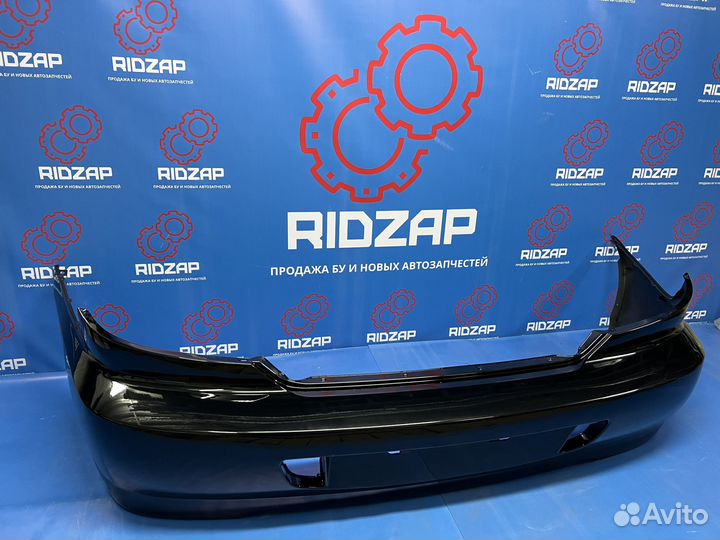 Бампер задний Kia Spectra