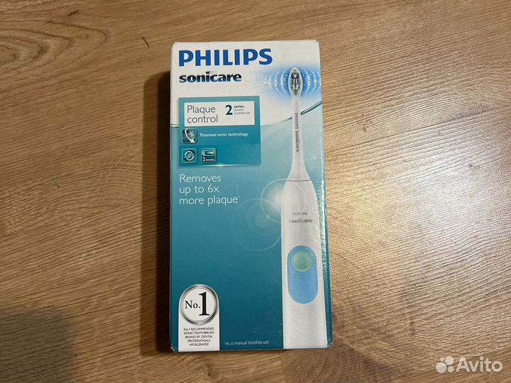 Электрическая зубная щетка philips