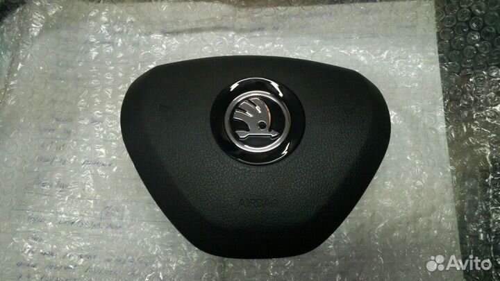 Заглушка в руль на Шкоду Рапид