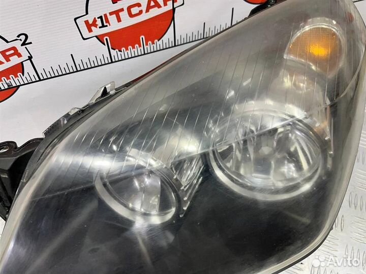 Фара левая Opel Astra H