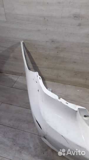 Бампер задний под парктроники Toyota Corolla E 150