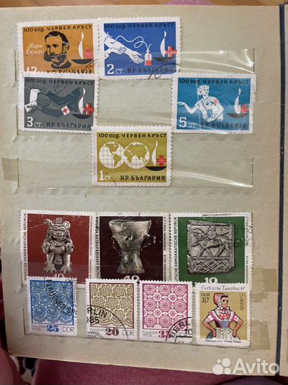 Марки почтовые разных стран в книге