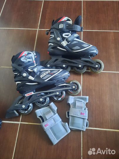 Роликовые коньки