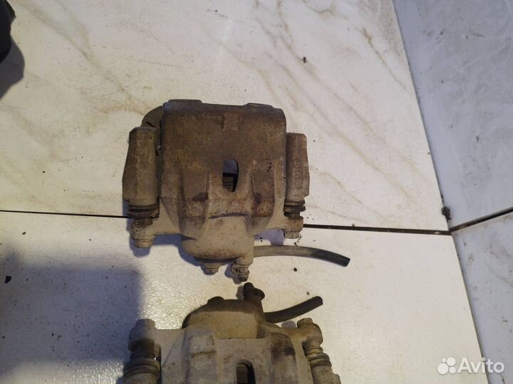 Суппорт тормозной передний BYD F3 2008 bydf3