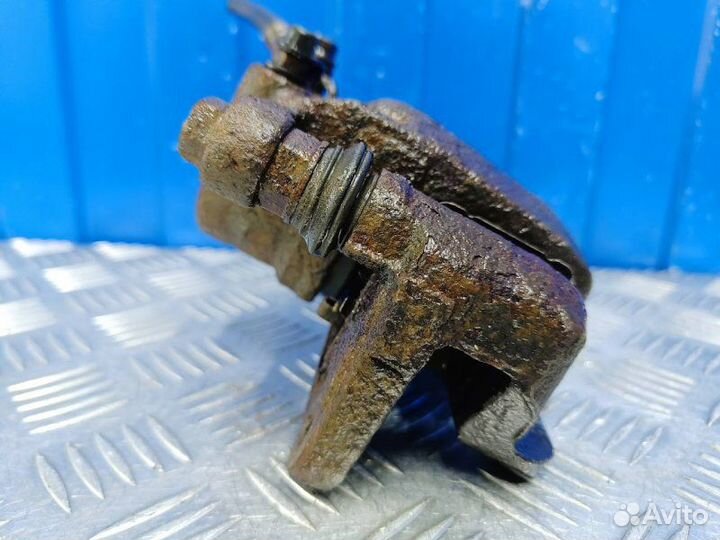 Суппорт задний левый Kia Sorento 2 XM 2.2 D4HB