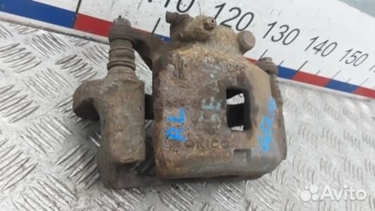 Суппорт тормозной передний левый mitsubishi L200 K