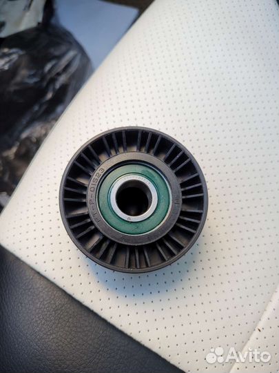 Натяжной ролик ремня нива шевроле