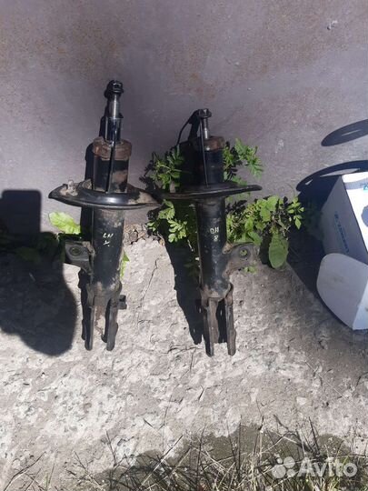 Передние амортизаторы киа спортаж 3 оригинал
