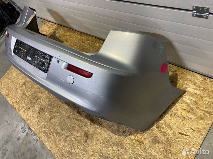 Бампер задний Mitsubishi Lancer