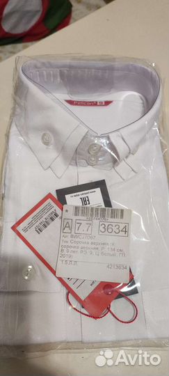 Рубашка для мальчика новая 134