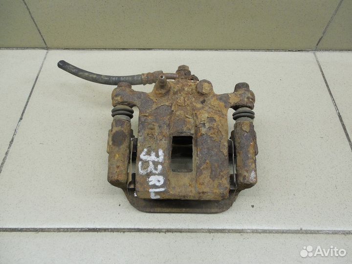 Суппорт задний левый X-Trail (T30) 2001-2006