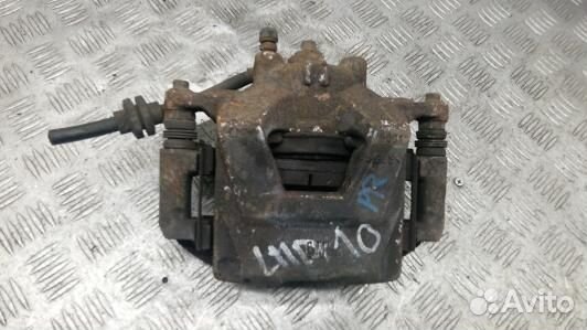 Суппорт тормозной передний правый opel astra J (LM