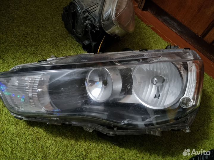 Фара левая на mitsubishi lancer 10