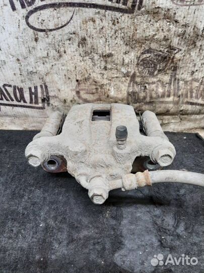 Суппорт задний левый Nissan X-Trail MR20 2012