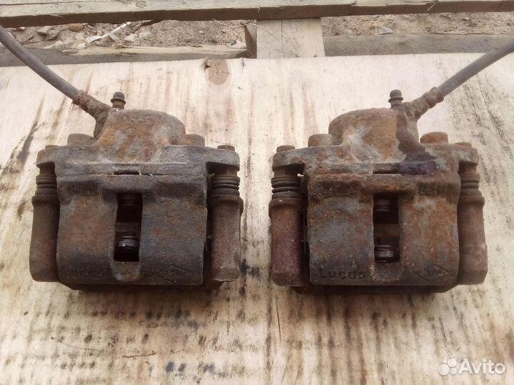 Суппорт тормозной Рено Логан 1