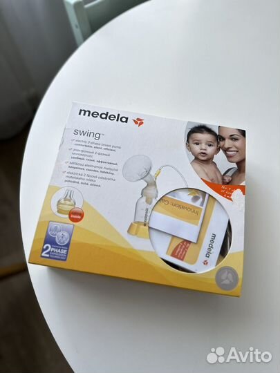 Молокоотсос medela swing электрический