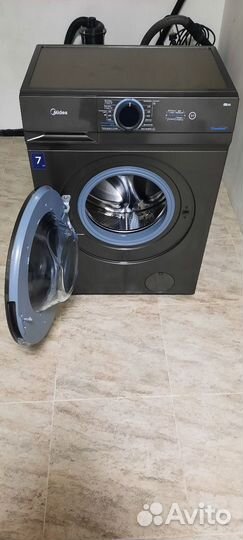 Стиральная машина бу Midea MF100W70/S-RU