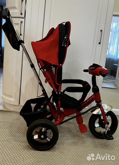 Трехколесный велосипед с ручкой