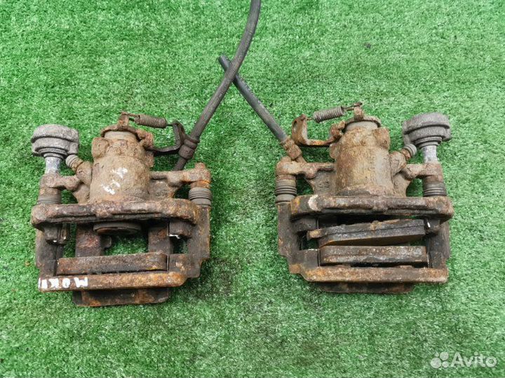 Суппорт тормозной задний Opel Mokka 1.6 A16XER