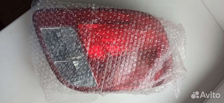 Фара новая задняя левая Kia Rio