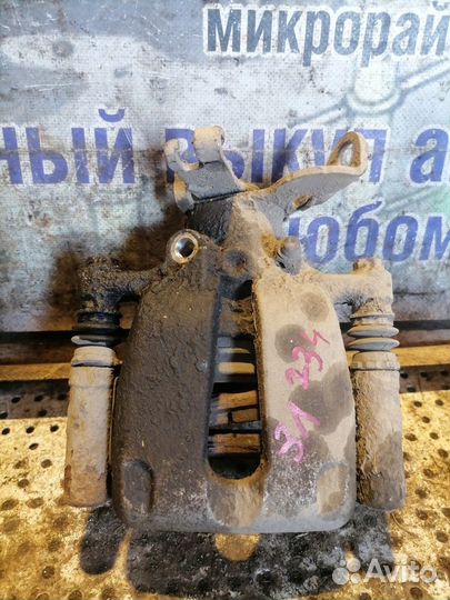 Суппорт задний левый Opel Insignia 1 (2008-2013)