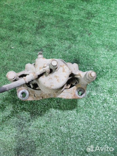 Суппорт тормозной передний левый Hyundai Getz