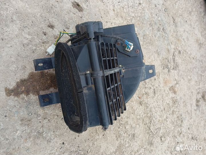 Моторчик печки в корпусе lifan smily