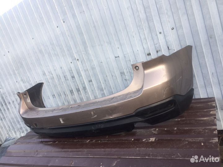 Бампер задний Subaru Forester 57704-SG010