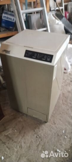 Стиральная машина с вертикальной загрузкой