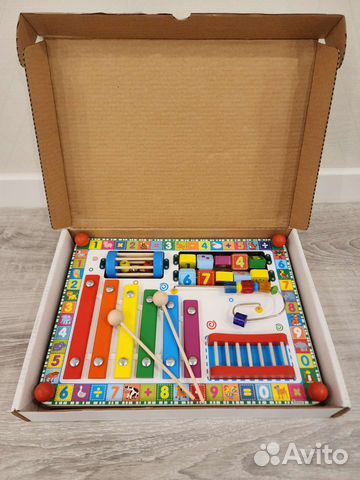 Детская игрушка бизиборд