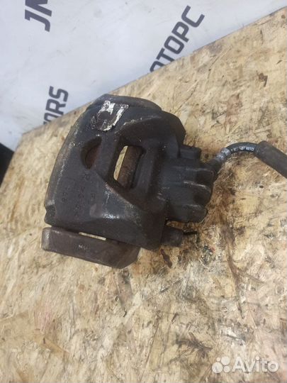 Суппорт тормозной передний правый Peugeot/Citroen