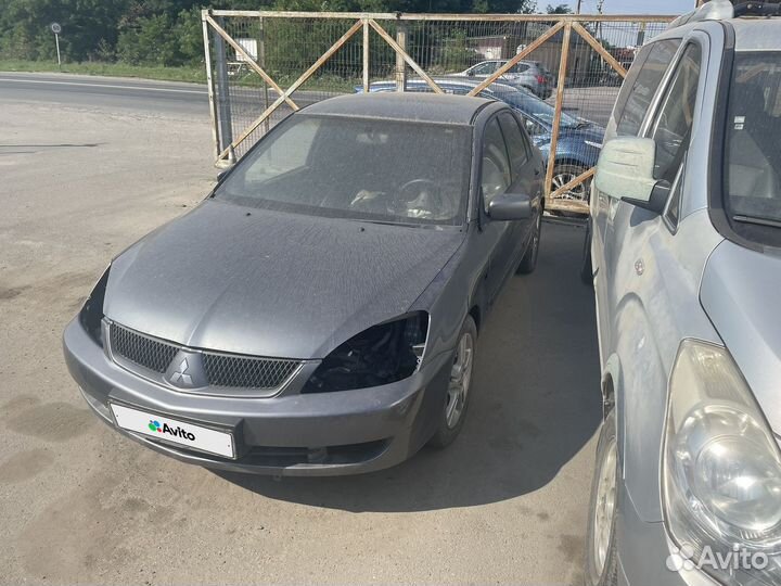 Mitsubishi Lancer 2.0 МТ, 2005, 180 000 км