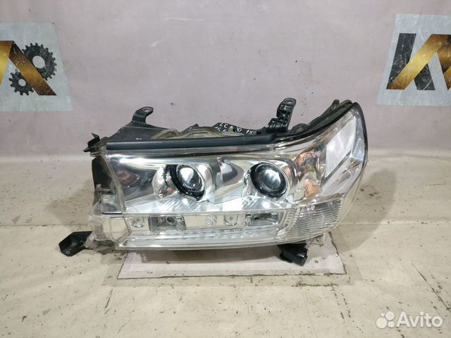 Фара Левая 15- Toyota Land Cruiser 200 Бу оригинал