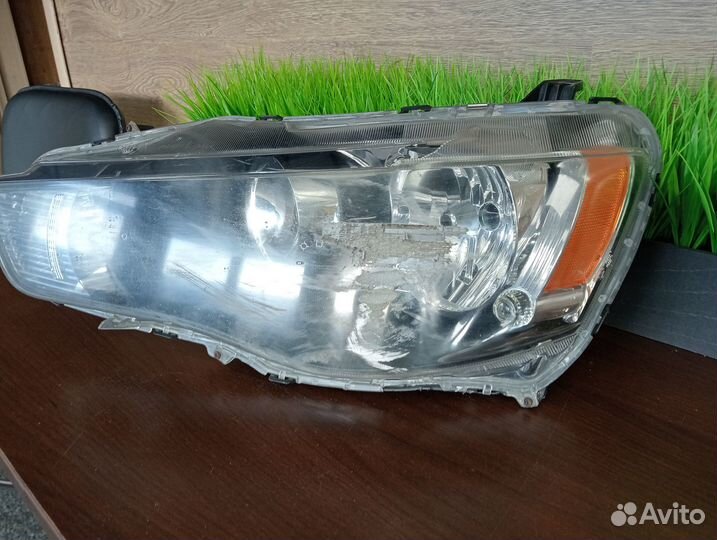 Фара левая Mitsubishi Lancer X P6117