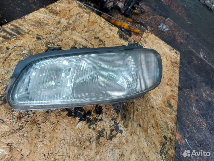 Фара левая для Opel Omega B 1994-2003