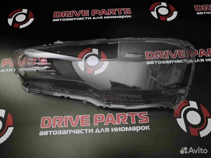 Стекло фары Mitsubishi Lancer 10 2007-2015 левое