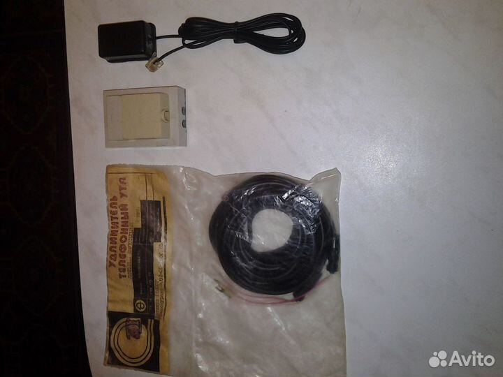 Телефонный удлиннитель с розетками