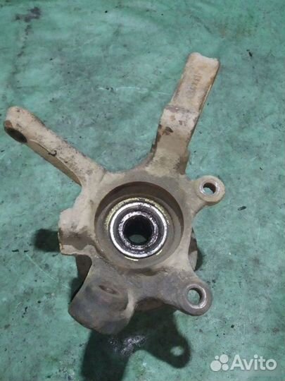 Кулак поворотный левый Nissan Almera N16