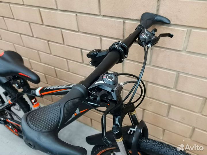 Велосипед на литых дисках 24 дюйма,чёрно-оранжевый