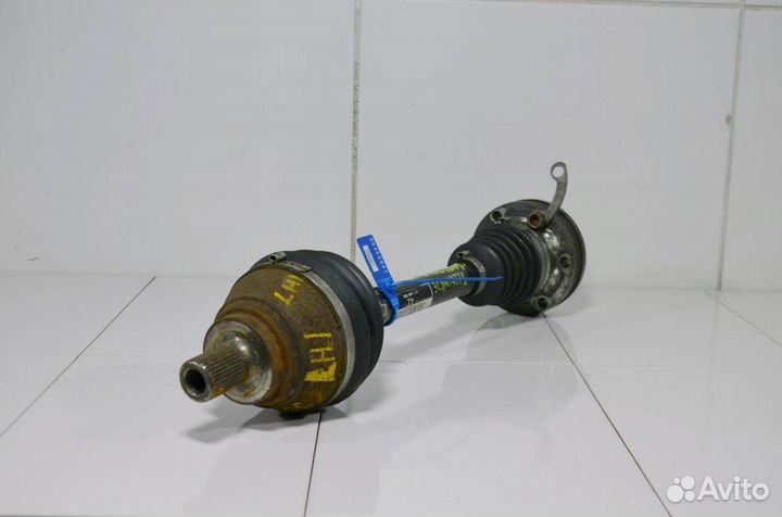 Приводной вал передний левый Volkswagen Passat