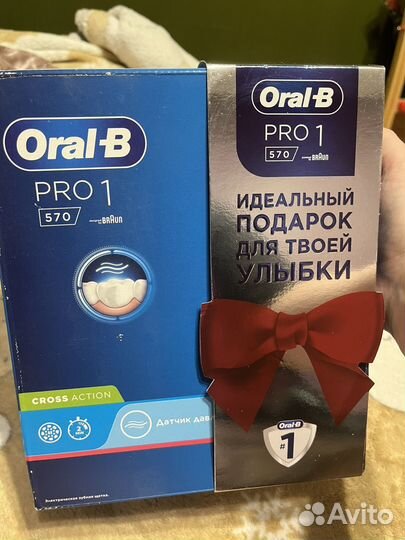 Электрическая зубная щетка oral b pro 1 570