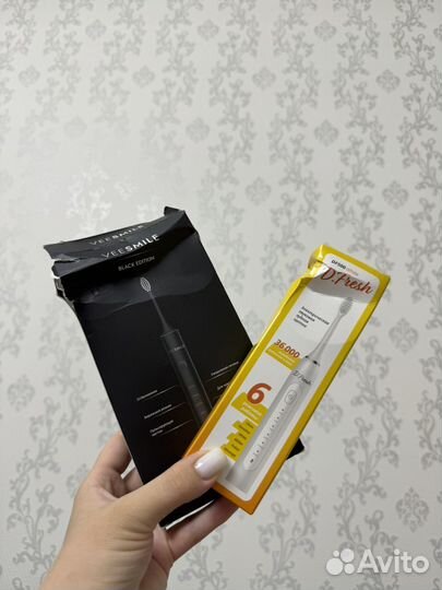 Электрическая зубная щетка