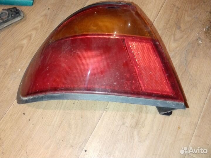 Фонарь задний левый Мазда 323 ba