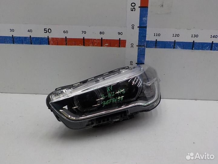 Фара левая BMW X1