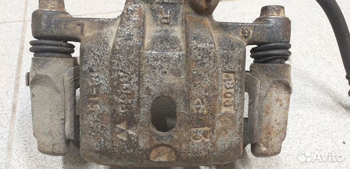 Суппорт Mitsubishi Delica, правый задний