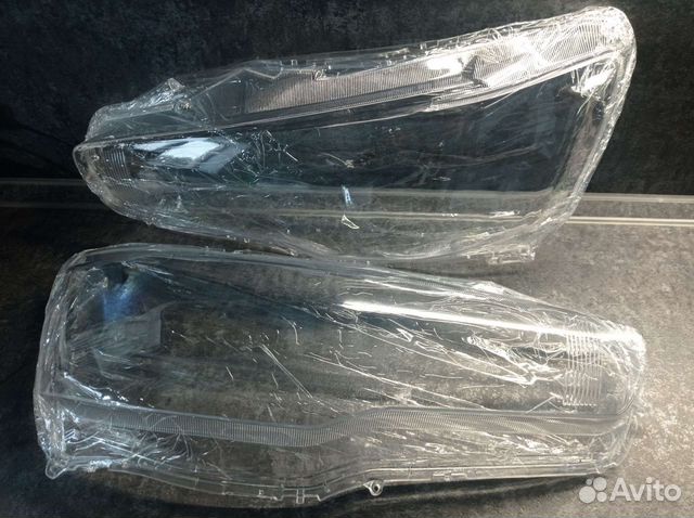 Стекло фары lancer 10