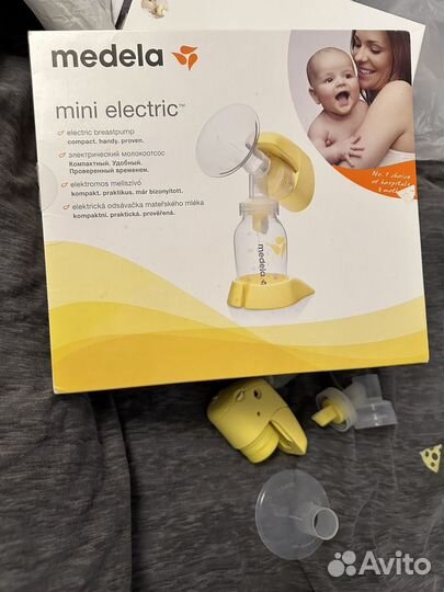 Молокоотсос medela электрический