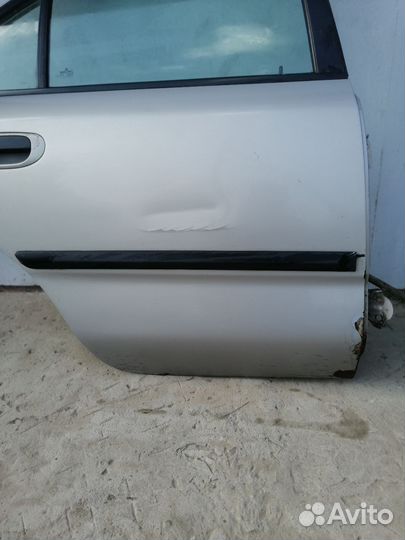 Дверь Митсубиси Каризма