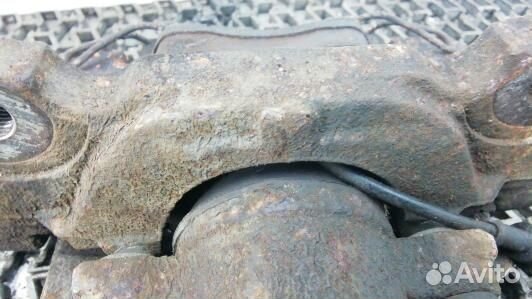 Суппорт тормозной передний левый skoda octavia A5